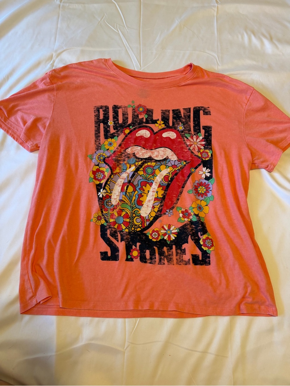 the Rolling Stones Coral Pink Kids Short Sleeve Tee with Floral Tongue Graphic
